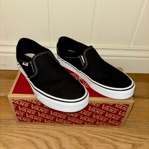Vans Women's Black and White Slip-On Sneakers
Worn once, like new